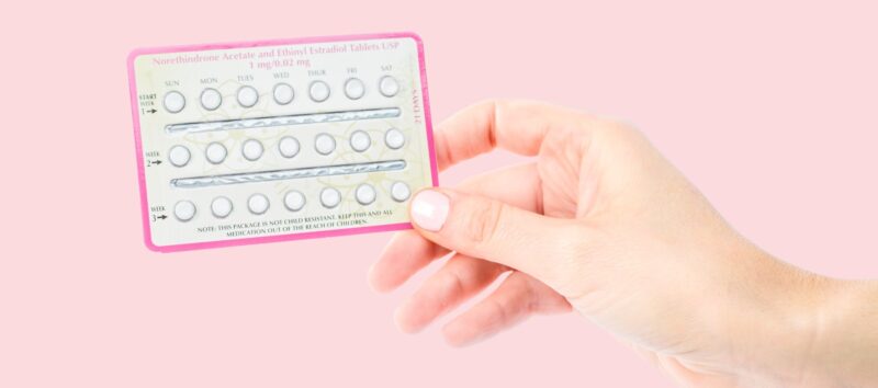 birth control pill pack in hand